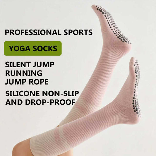 women wearing pink non slip pilates grip socks during workout