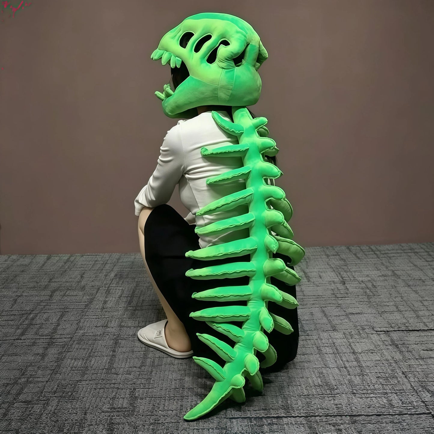 Soft plush dinosaur skull hood accessory with skeleton design for cozy funny outfits